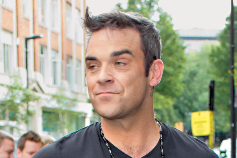 Robbie Williams: Sam sebi se zdi kot portir (foto: Shutterstock)