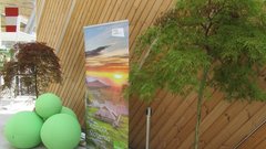 
                                                         Oglasni pano s podobo Velike planine na Expu  primeren za spominsko fotografianje