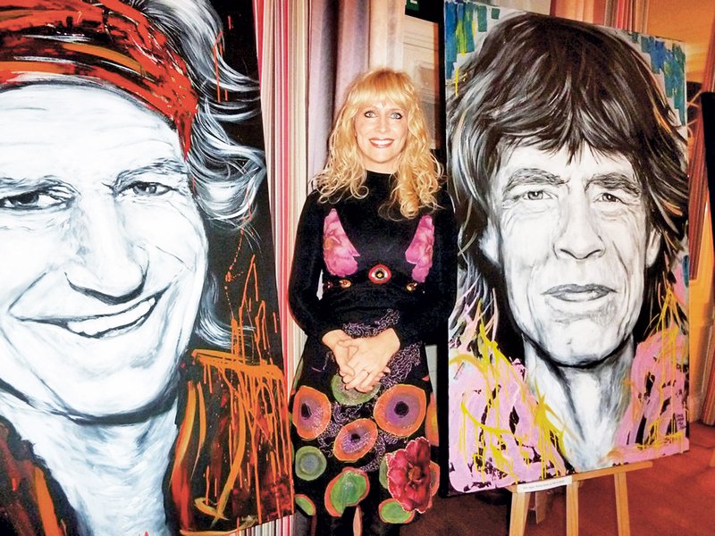 Legendarno razstavo portretov Rolling Stonesov si je ogledal tudi brat Micka Jaggerja. (foto: Mediaspeed)