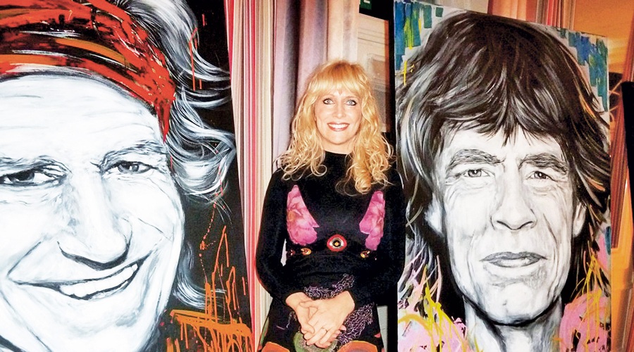 Legendarno razstavo portretov Rolling Stonesov si je ogledal tudi brat Micka Jaggerja. (foto: Mediaspeed)