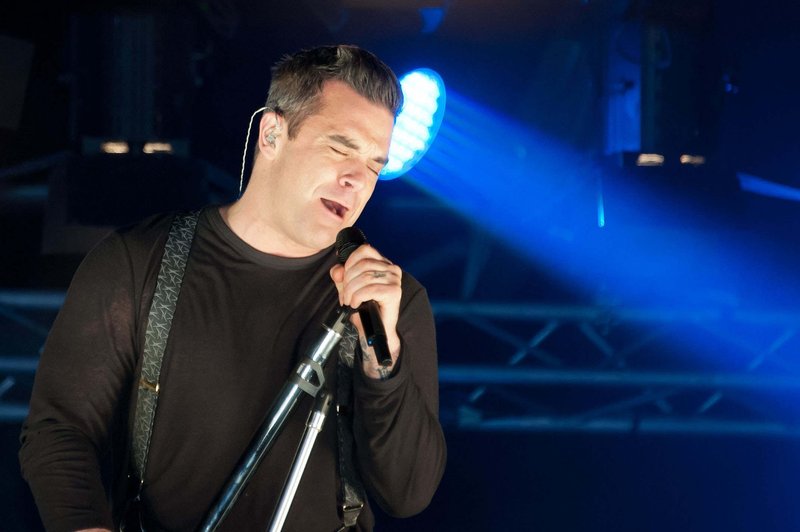 Robbie Williams se bo na svoji turneji ustavil tudi v Celovcu (foto: profimedia)