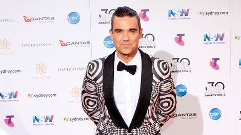 Robbie Williams: V devetdesetih je toliko pil in se drogiral, da je skoraj umrl!