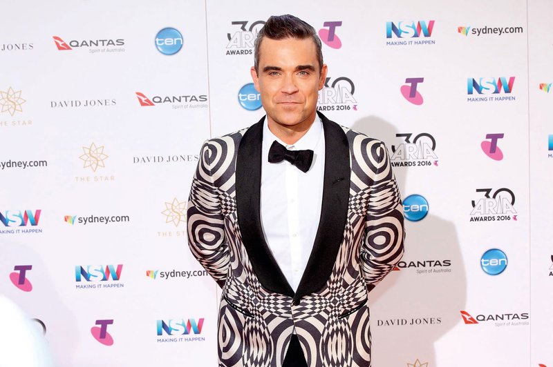 Robbie Williams: V devetdesetih je toliko pil in se drogiral, da je skoraj umrl! (foto: Profimedia)