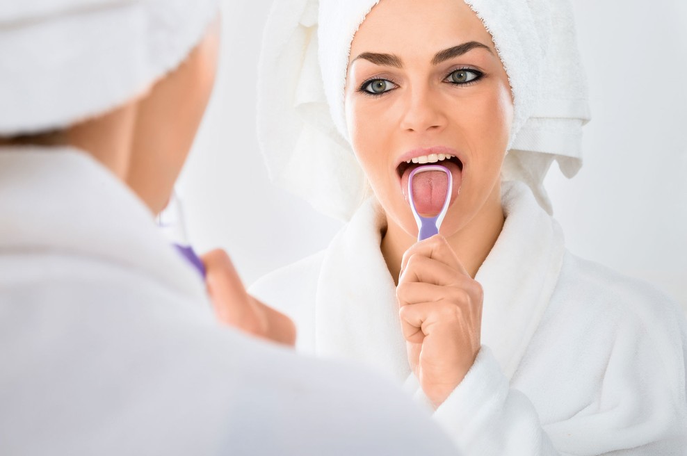 Poleg zob si je treba čistiti tudi jezik (foto: Shutterstock)