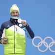 Čigave so medalje olimpijskih športnikov, če jih tako kot Jakov Fak osvajajo pod drugo zastavo?