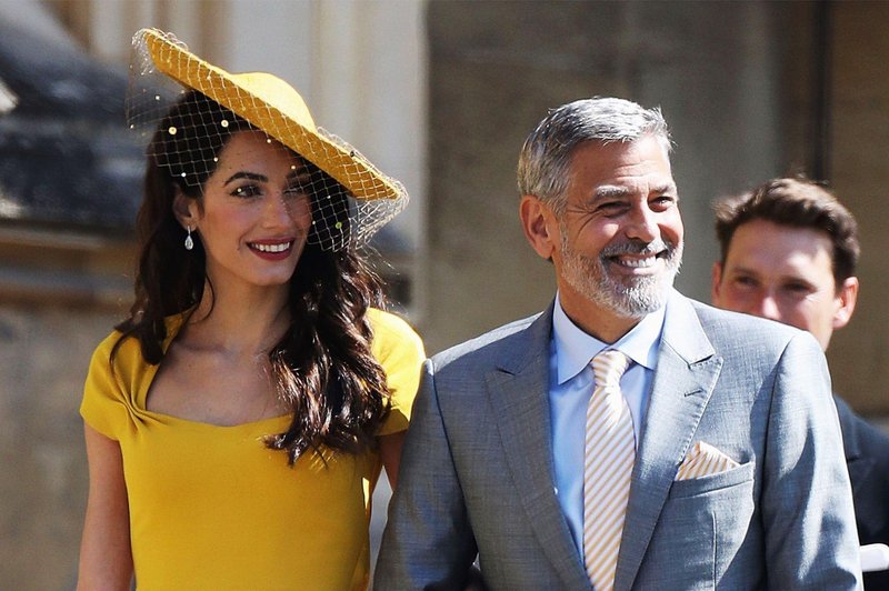 George Clooney na kraljevi poroki plesal s Kate Middleton in Meghan Markle, ena dama pa ga je zavrnila (foto: Profimedia)