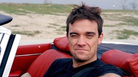 Robbie Williams s pomočjo nadomestne mame vnovič postal očka!