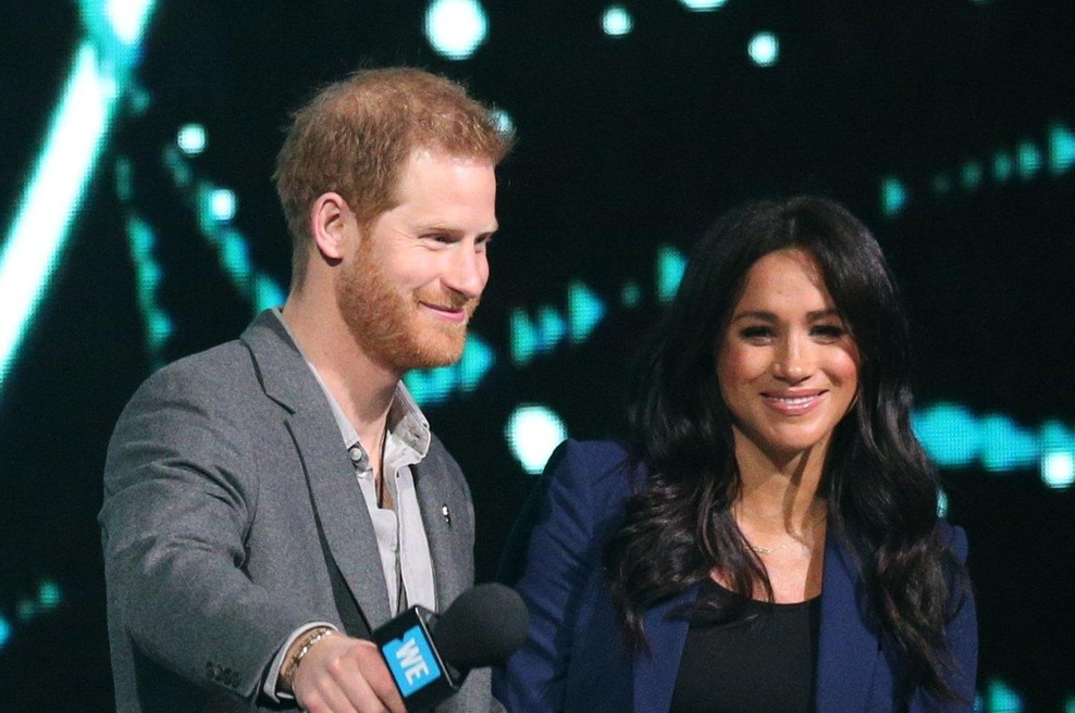 Takole je princ Harry na oder povabil vojvodinjo Meghan in se ji zahvalil za vse. (foto: Profimedia Profimedia, Press Association)