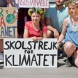 Podnebni aktivisti sklenili človeško verigo okoli nemškega parlamenta