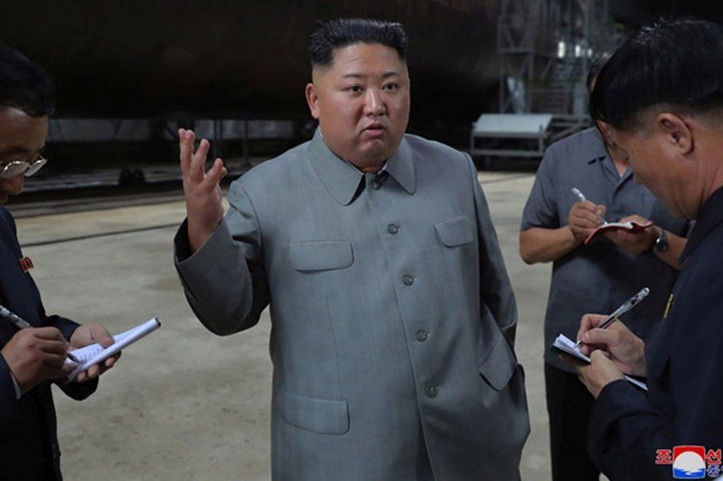 Kim Jong-un znova rožlja z orožjem (foto: Profimedia)