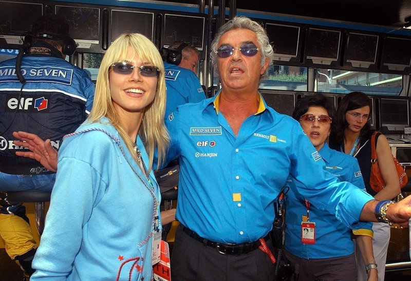 (dpa) - Italian Renault team captain Flavio Briatore and German top-model Heidi Klum stand at the Grand Prix of Monaco racetrack in Monte Carlo, 1 June 2003. Once again the 'rich and beautiful' gathered in Monte Carlo to watch the Formula 1 cars dash through the narrow streets of the city. Briatores new girlfriend Heidi Klum celebrated her birthday 1 June 2003 in Monte Carlo.,Image: 675253979, License: Rights-managed, Restrictions:, Model Release: no