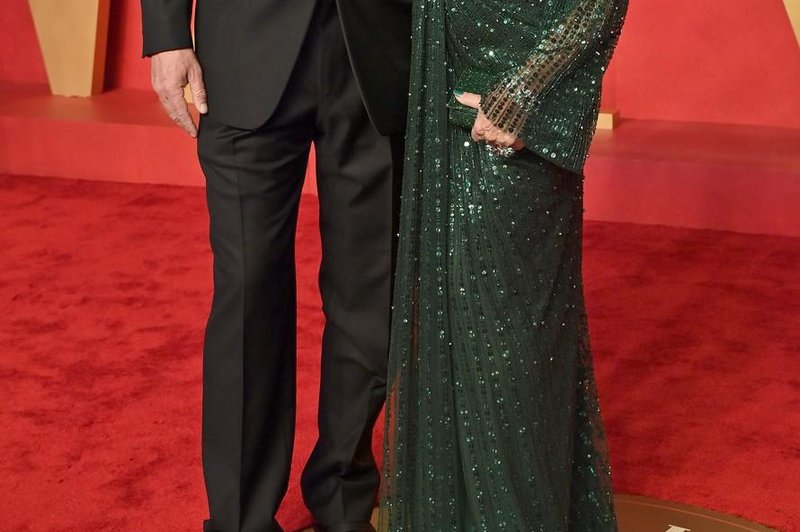 Igralka Joan Collins z možem (foto: Profimedia)