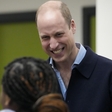 Princ William prvič po slabi novici nasmejan v javnosti, vsi pa so gledali v nekoga, ki ga je spremljal ...