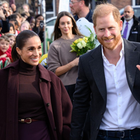 Harry in Meghan znova skupaj v javnosti: odziv množice presenetil mnoge (FOTO)